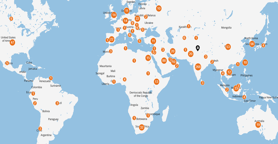 A map of the world with orange circlesDescription automatically generated